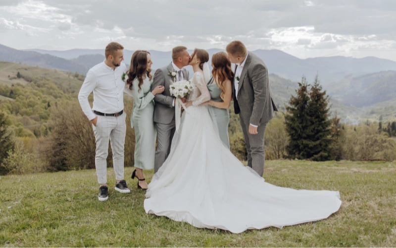 Intimate outdoor wedding ceremony in Mallorca with a small group of guests in a garden setting