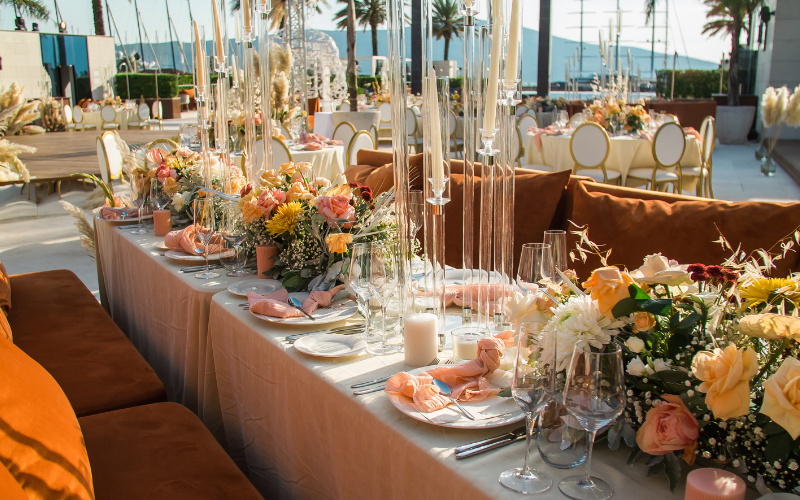 Mediterranean wedding styling with olive branches, white linen and terracotta touches on a Mallorcan terrace